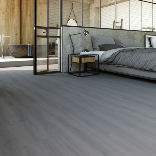 Slaapkamer met moderne uitstraling dankzij Moduleo Layred Classic Oak 24940 vloer in grijs eiken