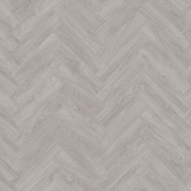 Topview van Moduleo Layred Herringbone Laurel Oak 2051914 vloer in grijs eiken met visgraat-motief