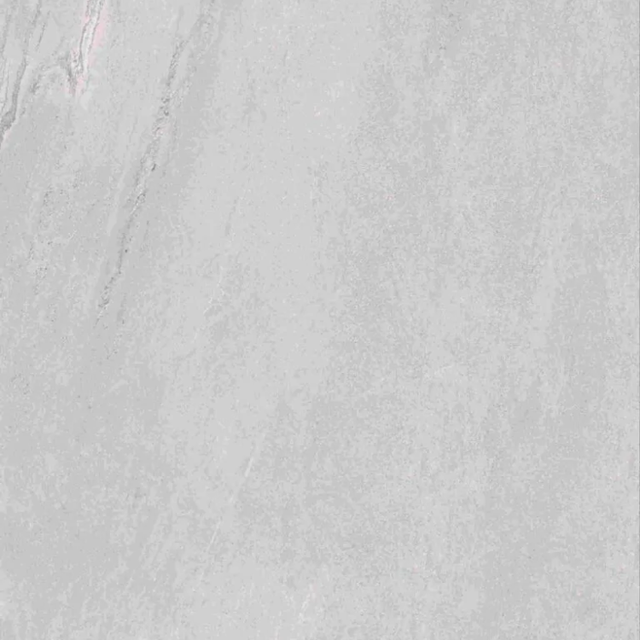 Topview van Muro waterbestendige wandpanelen beton in licht grijs met tegel motief.