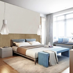 Slaapkamer met rustige uitstraling dankzij de Muro waterbestendige wandpanelen eiken gerookt vloer